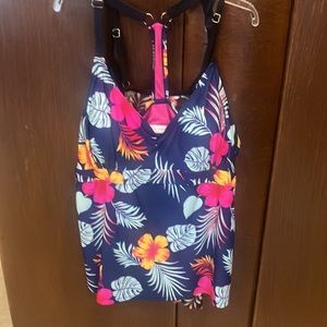 Two swimwear tops used once